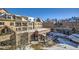Exterior of multi-story property featuring snow-covered roofs and pedestrian area at 505 S Main St # 1313, Breckenridge, CO 80424