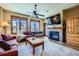 Comfortable living room with a fireplace, and large windows at 505 S Main St # 1313, Breckenridge, CO 80424