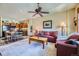 Cozy living room open to kitchen and dining with comfortable seating and natural light at 505 S Main St # 1313, Breckenridge, CO 80424