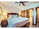 Comfortable main bedroom features an inviting bed, natural light, and access to the bathroom at 505 S Main St # 1313, Breckenridge, CO 80424