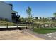 Backyard featuring a wooden fence, turf, gravel and a beautiful view at 17719 Prairie Peak Trl, Parker, CO 80134