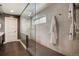 Modern bathroom featuring a glass enclosed shower with a rainfall shower head and a sleek design at 2334 Lowell Blvd, Denver, CO 80211