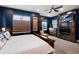 Bedroom featuring fireplace, TV, and large windows at 2334 Lowell Blvd, Denver, CO 80211