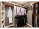 Organized walk-in closet with shelves, hanging rods, and ample storage space for clothes and accessories at 2334 Lowell Blvd, Denver, CO 80211