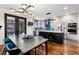 Kitchen and dining area with access to the outdoor living area at 2334 Lowell Blvd, Denver, CO 80211