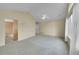 Large bedroom with neutral carpet, a ceiling fan, and windows providing plenty of natural light at 18142 E Oakwood Pl, Aurora, CO 80016