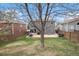 Large backyard with a patio area, perfect for outdoor entertaining at 9250 Roadrunner Dr, Highlands Ranch, CO 80129