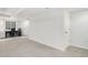 Finished basement area, with a work desk setup with a window and a separate door leading to a storage closet at 9250 Roadrunner Dr, Highlands Ranch, CO 80129