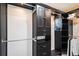 Custom closet with built-in shelving, hanging rods, and ample storage space at 9250 Roadrunner Dr, Highlands Ranch, CO 80129