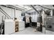 Laundry room with a washer, dryer, and mechanical equipment at 972 S Zeno Way, Aurora, CO 80017