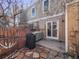 Backyard patio with sliding doors, an outdoor grill and a rock garden, offering relaxation and entertainment at 1247 S Idalia St, Aurora, CO 80017
