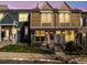 Charming townhouse exterior with unique architectural details and well-maintained landscaping at 1247 S Idalia St, Aurora, CO 80017