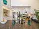 Spacious kitchen with granite counters, a stainless steel refrigerator, and ample cabinet space at 1247 S Idalia St, Aurora, CO 80017