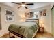 Comfortable bedroom with a ceiling fan and natural light, features tasteful decor at 124 E Colorado Ave # 2, Denver, CO 80210