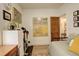 Bedroom featuring wood floors, a workspace, and comfortable daybed, showcasing a cozy and functional design at 124 E Colorado Ave # 2, Denver, CO 80210