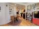 Open dining room connects to the kitchen and living area with hardwood floors at 124 E Colorado Ave # 2, Denver, CO 80210
