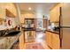 Efficient kitchen flows into the living area, creating an open and airy space at 124 E Colorado Ave # 2, Denver, CO 80210