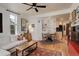 Inviting living room with hardwood floors seamlessly connects to the adjacent kitchen at 124 E Colorado Ave # 2, Denver, CO 80210
