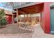 Cozy outdoor patio under a deck with a table and chairs, perfect for relaxing at 124 E Colorado Ave # 2, Denver, CO 80210