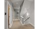 Bright hallway with carpet flooring, recessed lighting, and access to different areas of the home at 4544 Utica St, Denver, CO 80212