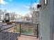 Balcony view showcases the contemporary building design and the urban neighborhood surroundings at 4544 Utica St, Denver, CO 80212
