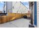 Backyard with a fenced area, great for activities, and with a grill and AC unit at 1259 Perry St, Denver, CO 80204