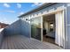 Private deck with sliding glass door, a view to the bedroom, and space for outdoor seating at 1259 Perry St, Denver, CO 80204