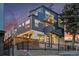 Stunning modern home featuring multiple balconies, ample windows, and an inviting facade at 1259 Perry St, Denver, CO 80204