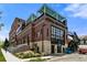 Odell Brewing Co building in a modern brick commercial complex with awning-covered rooftop terrace at 1259 Perry St, Denver, CO 80204