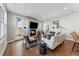 Cozy living room featuring a fireplace, comfortable seating, and stylish decor at 1259 Perry St, Denver, CO 80204