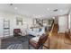 Open concept living room flowing seamlessly into the modern kitchen at 1259 Perry St, Denver, CO 80204