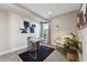 Bright home office with modern clear desk, comfortable chair, and stylish decor at 1259 Perry St, Denver, CO 80204