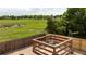 Wooden deck with a view of a green and lush backyard at 11381 Jay St, Westminster, CO 80020