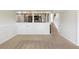 The large basement area is carpeted and is set up for entertaining with the staircase nearby at 11381 Jay St, Westminster, CO 80020