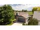 Well-maintained home featuring a two-car garage, mature trees and landscaped yard at 11381 Jay St, Westminster, CO 80020