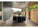 Covered patio perfect for outdoor dining with a fenced yard at 11381 Jay St, Westminster, CO 80020