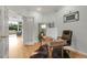 Well-lit home office with a modern desk and French door access at 1033 Bramblewood Dr, Castle Pines, CO 80108