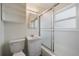Bright, clean bathroom with vanity, toilet, and glass shower enclosure at 1909 Iola St, Aurora, CO 80010