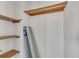 Unfinished closet with built in shelving at 8911 W Yale Ave, Lakewood, CO 80227