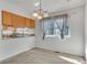 Cozy dining area with ample natural light and direct views into the kitchen at 8911 W Yale Ave, Lakewood, CO 80227