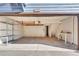 Spacious two-car garage with built in shelving and workbench at 8911 W Yale Ave, Lakewood, CO 80227