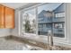 Kitchen sink with a window view of the backyard at 8911 W Yale Ave, Lakewood, CO 80227