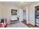 Well-lit Bedroom with closet, hardwood floors, and cute decor; perfect for a new baby at 7080 Beach St, Westminster, CO 80030