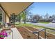 Street view from the brick home's porch, showing landscaping and neighborhood charm at 7080 Beach St, Westminster, CO 80030