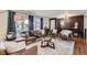 Cozy living room featuring stylish decor, hardwood floors, and a comfortable seating arrangement at 7080 Beach St, Westminster, CO 80030