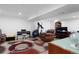 Finished basement featuring an entertainment area, home office space, and rec area at 23 S Nome St # A, Aurora, CO 80012
