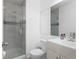 Modern bathroom featuring glass shower, updated fixtures, and clean, stylish design at 23 S Nome St # A, Aurora, CO 80012