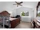 Spacious bedroom with hardwood floors, two dressers, and a closet at 23 S Nome St # A, Aurora, CO 80012