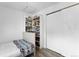 Well-lit bedroom with closet and bookshelf at 23 S Nome St # A, Aurora, CO 80012