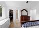 Bedroom featuring a walk-in closet and en suite bathroom at 23 S Nome St # A, Aurora, CO 80012